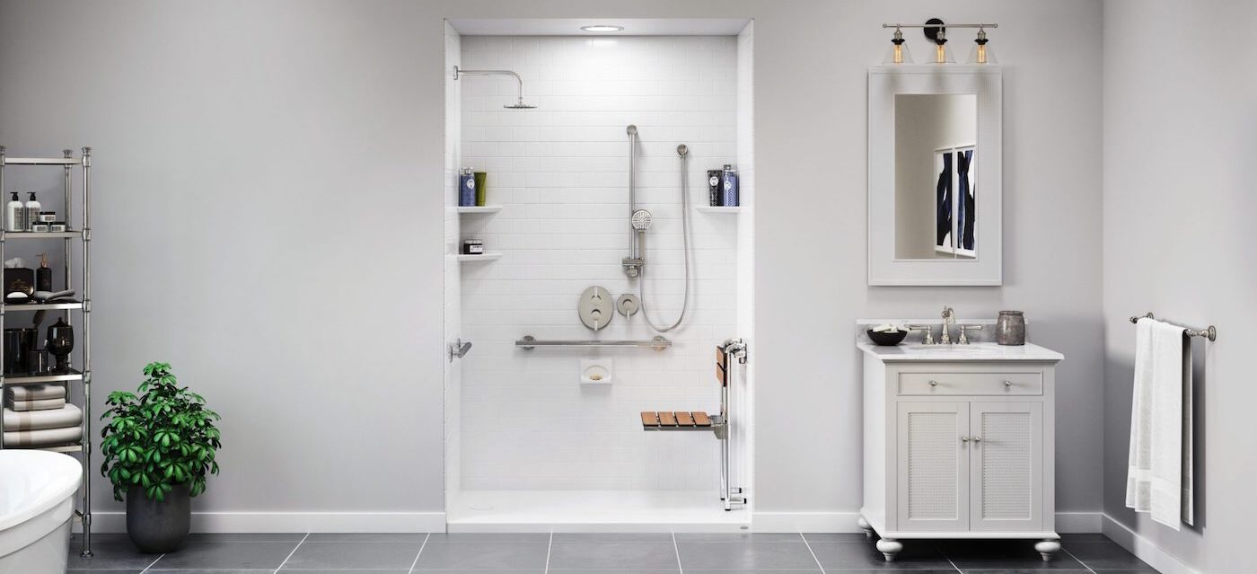 Modern bathroom with safety features such as a barrier-free shower, grab bar, and shower seat